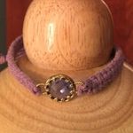 Purple Pull String Bracelet Photo 0