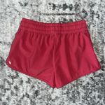 Vuori  Clementine Shorts in Sierra Red Coral Photo 1