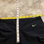 Nike  Dri Fit low rise crop capri leggings black blue green mesh xs 19” inseam Photo 3