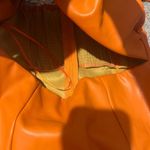 Glam  orange Leather Bow Dress size small Photo 6