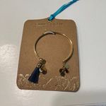Shiraleah ‎ Gold Bangle Bracelet with Navy Blue Tassel and Coin Charms Boho Style Photo 1