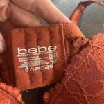 Bebe  size 36D burnt orange lace tshirt bra Photo 3