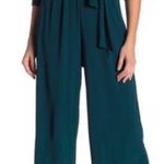 SuperFoxx Teal Faux Wrap pleated front stretch 3/4 sleeve jumpsuit Blue Size M Photo 2