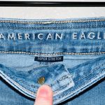 American Eagle AE Light Wash Button Front HI Rise A-line Mini Denim Skirt Photo 2