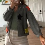 THML  boutique star knit cardigan size small Photo 1