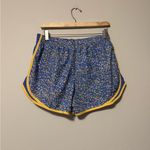 Nike  Women's Blue and Yellow Athletic Shorts Photo 2