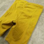 Athleta Ultimate Stash Pocket 7" Shorts Yellow Mustard High Rise Bike size XS Photo 2