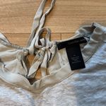 Calvin Klein Jeans  short sleeve top with tie back size medium Photo 1