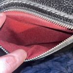 Franco Sarto  black leather bag. Red interior. Used with small minimal tears. Photo 7