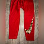 Nike Rare Red  Cheetah Swoosh Pants - Y2K Photo 1