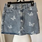 PacSun  new with tags butterfly denim jean skirt in a size 26 Photo 0