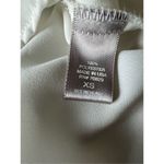 Charlotte Russe  off white sheer roll tab blouse with rhinestone accent Size XS Photo 4