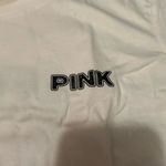 PINK - Victoria's Secret Vs pink small t shirt hot pink round graphics in the back Photo 2