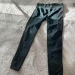 Fabletics  teal/turquoise and dark gray mid rise athletic leggings, size Medium Photo 0