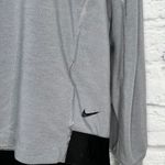 Nike  Womens Pullover Long Sleeve Shirt Size M Gray Logo Hem Dri-Fit Photo 1