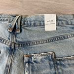 Good American Distressed Denim Shorts Photo 3