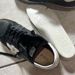 Golden Goose  Black and White Star Sneakers Photo 10