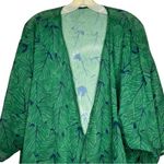 Sheer Polyester Swim Cover Photo 1