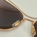 Miu Miu New with tags  56RS Sunglasses. Gold butterfly frame Photo 3