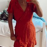 Francesca's Orange Wrap Dress Photo 0