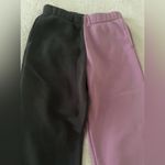 Two tone jogging pants in very good condition. Size M Photo 1