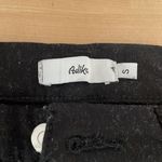 Adika  Cutout High Waisted Black Flare Jeans Photo 2