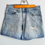 Levi's Levi’s Women’s Mid Length Mid Rise Light‎ Wash Distressed Denim Shorts Size 27 Photo 0