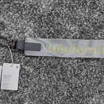 Lululemon Never Lost Keychain grey great and green Photo 0