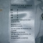 American Eagle  2 High Rise Shorty Jeans Light Wash Raw Hem Shorts Photo 3