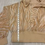 Free People Movement Tan Zebra Print half zip windbreaker Photo 3