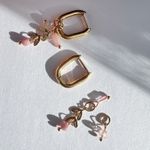 Gold hoop earrings with removable pink charms Photo 2