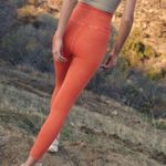 Free People Movement High-Rise 7/8 Happiness Runs Orange Leggings Size XS / S Photo 1