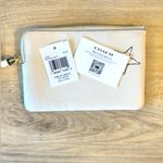 Coach NWT White and Yellow Clutch with Butterfly Art And Leather Strap Photo 1