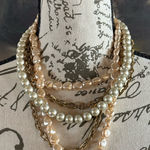 Elegant Pearl and Gold Layered Necklace Photo 0