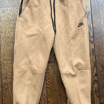Nike  Tech Fleece Joggers Size Medium Womens Mid Rise Sportswear Flax Brown $120 Photo 0