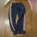 Aritzia TNA speed jogger navy, red, and white stripe size large Blue Photo 9