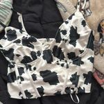 ThirtyOne Boutique Going out cow print top Photo 0