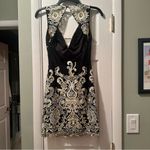 Jovani  Sz 2 gorgeous black and gold beaded dress.  Like new condition Photo 3