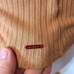 🆕‎ N: Philanthropy asymmetric cut ribbed tank size M BIN D Photo 2