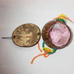 Coconut souvenir purse with painted face pearly bead nose & yarn handle Green Photo 4