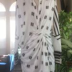 Elegant Leisure Asymmetric Casual Midi Dress Print Twist Design Shirt Dress Photo 1