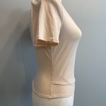Lululemon NEW  women's size 6 cream short sleeve top Photo 4