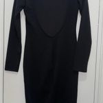 Only Is used  twice,it has some peeling in the front not noticeable,see last picture,runs small Photo 2