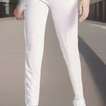 Adidas  Women’s Size Medium Tapered Mid Rise Track Pant. Clear Pink. New with Tag Photo 0