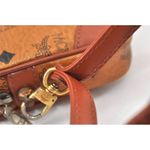 MCM  Brown Clutch with Logo Pattern and Wrist Strap Photo 7