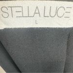 Stella Luce black high neck asymmetrical hem tunic top size large Photo 3