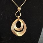 Gold Waterdrop Brushed Pendant on a Gold Rope Chain Photo 0