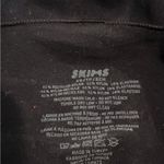 SKIMS  Strapless Sculpting Bodysuit Photo 1