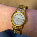 Women's Gold Tone Bangle Bracelet Watch with Intricate Detail, MOP Face Gold Photo 1