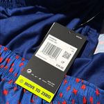 Nike Blue and Red Athletic Shorts with Polka Dot Design Photo 3